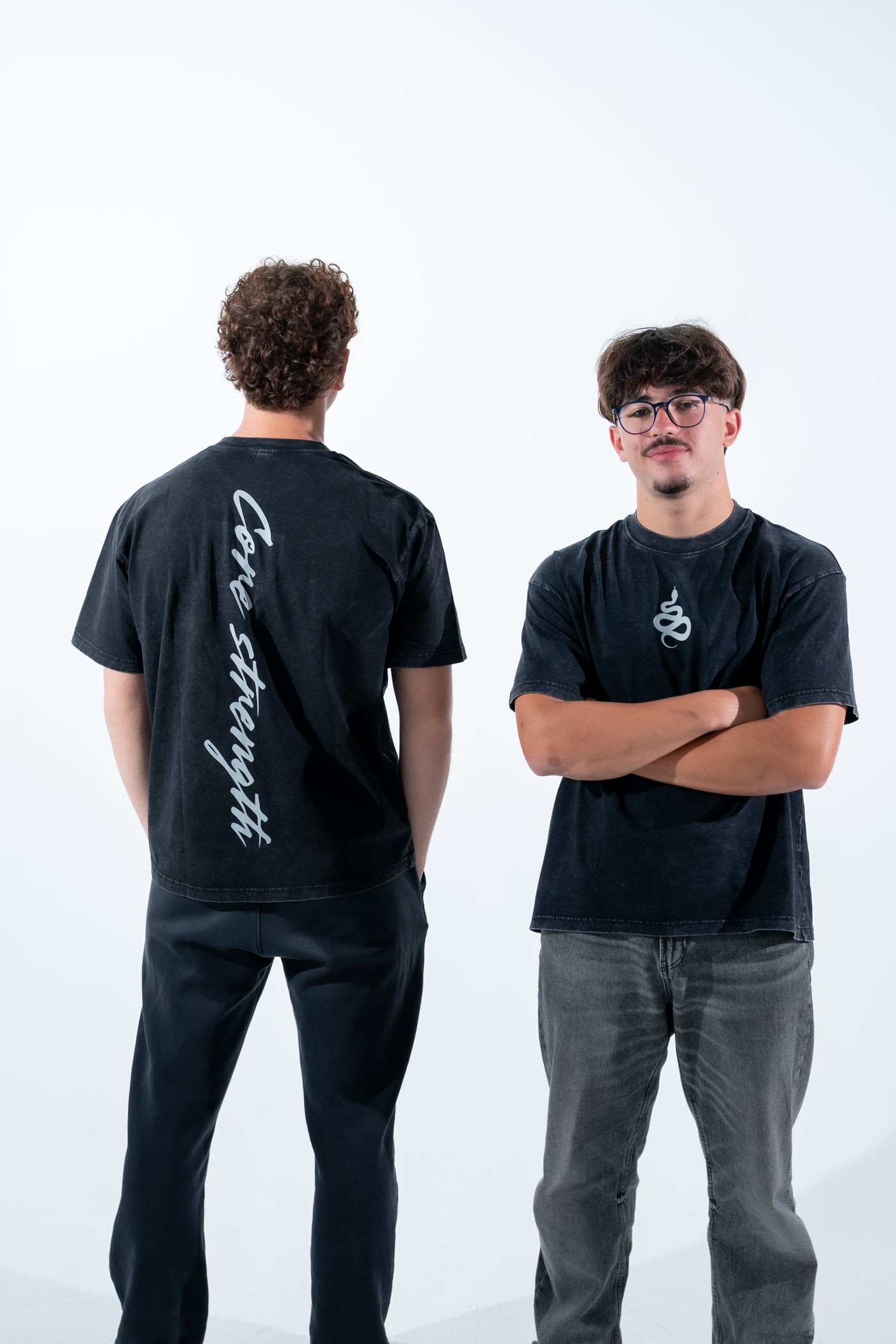 Vertical Core strength script on the back of the white-logo tee