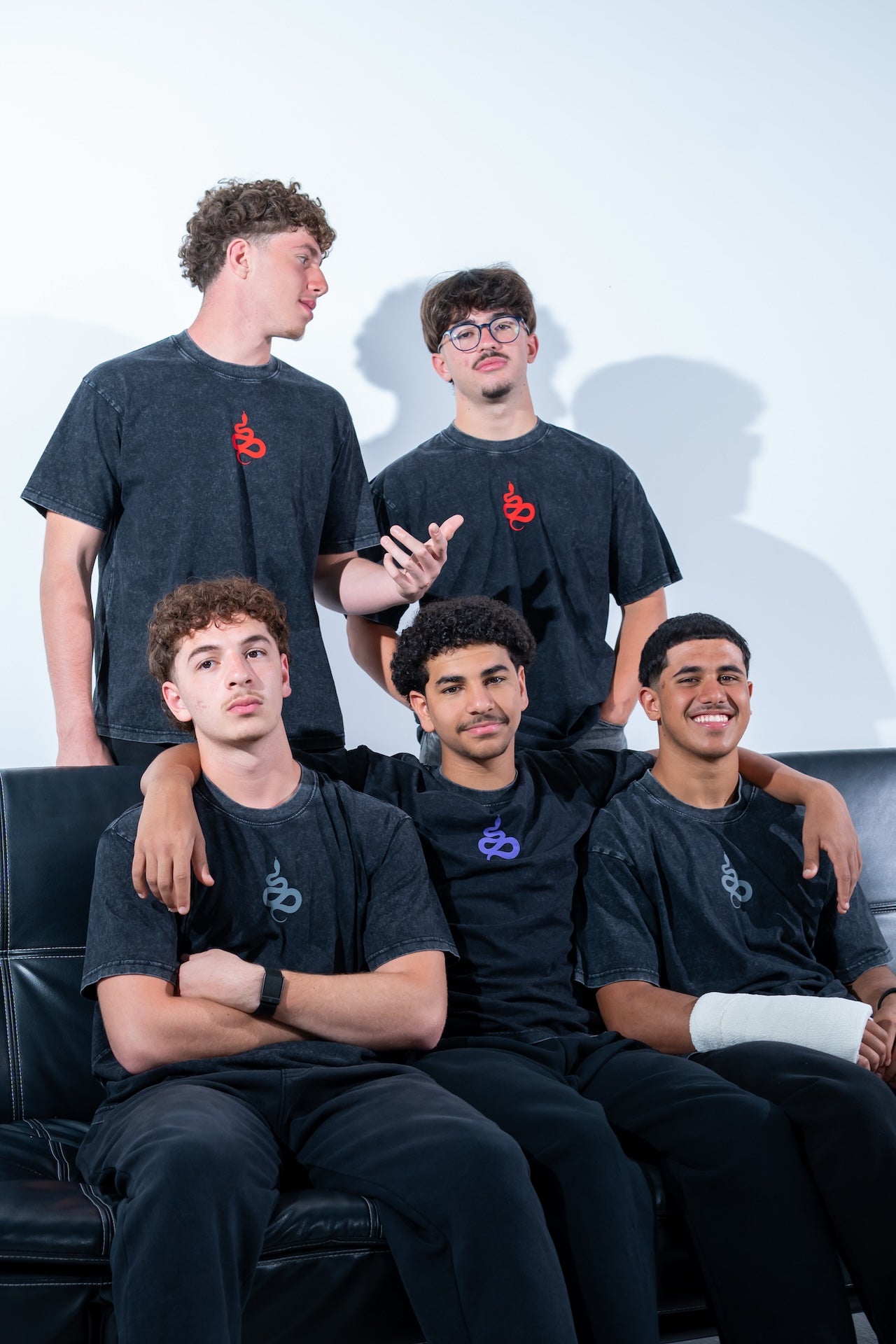 Team group photo in black tees