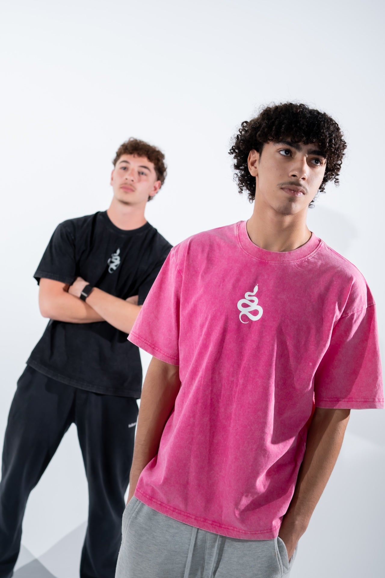 Team member in the hot pink tee